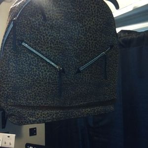 Stelladot purse and back pack